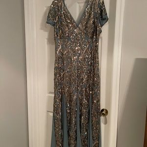 Beautiful gold beaded gown with teal undertones!